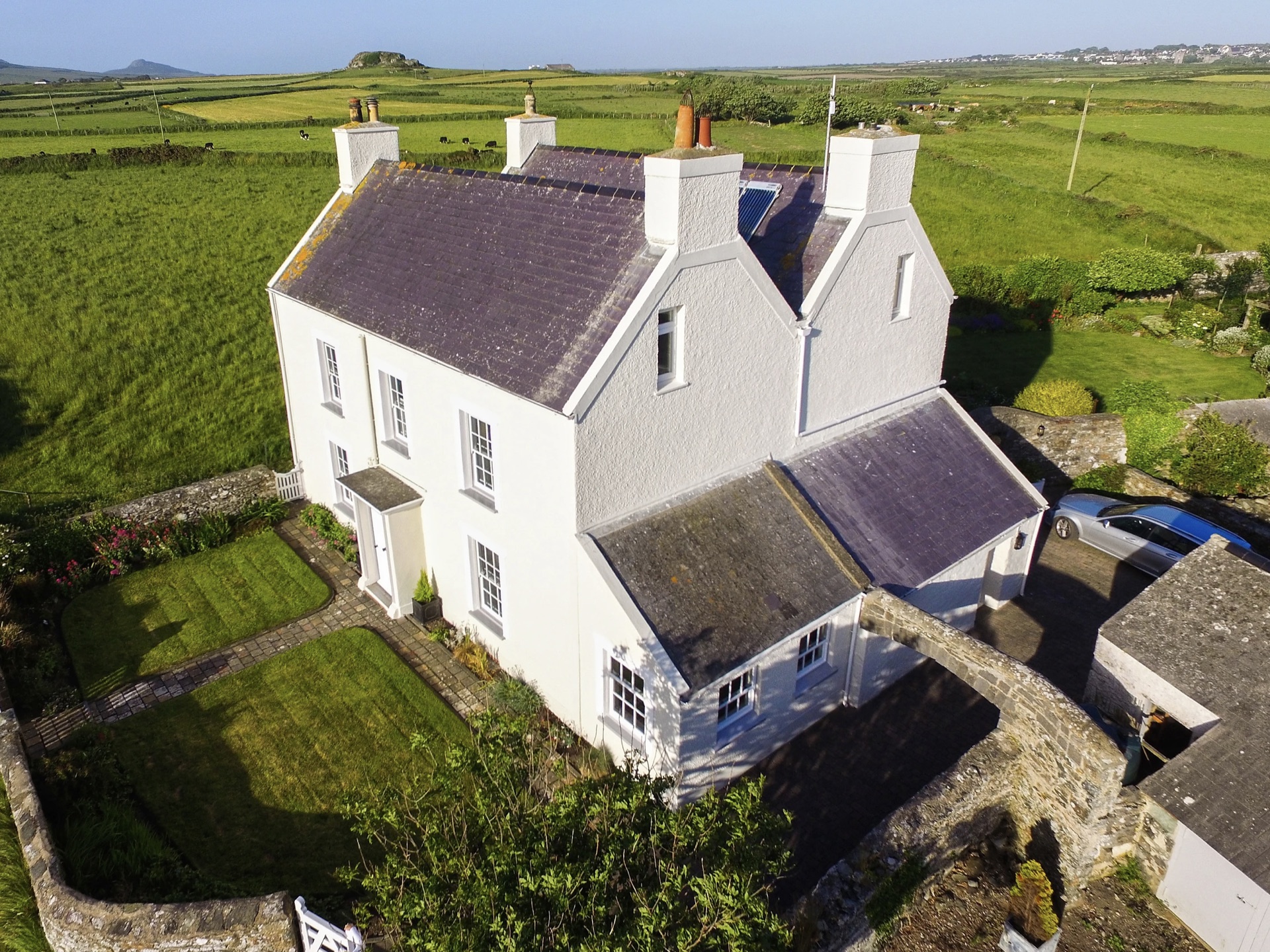 Aerial — coastal Welsh house, full restoration